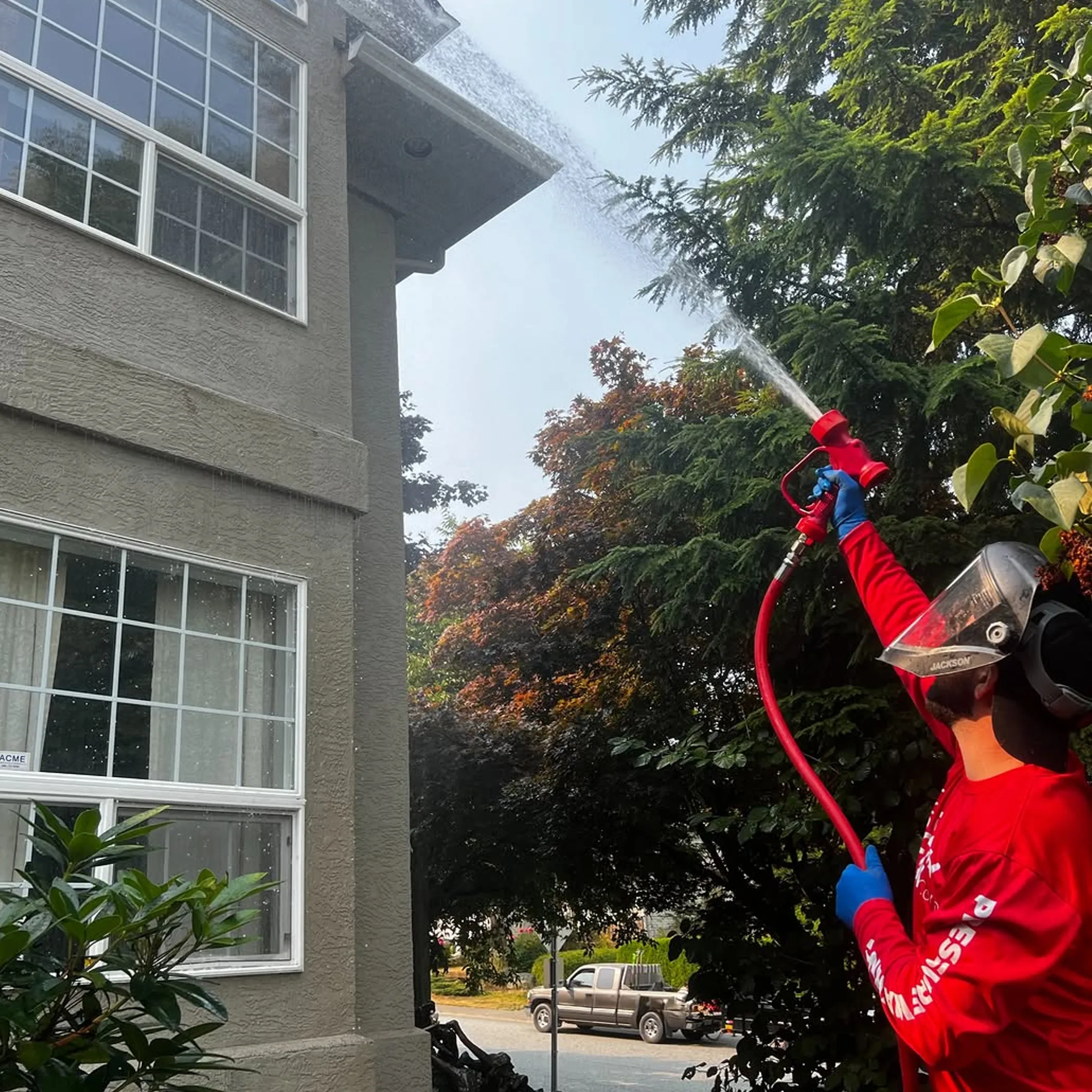 house exterior being pressure cleaned