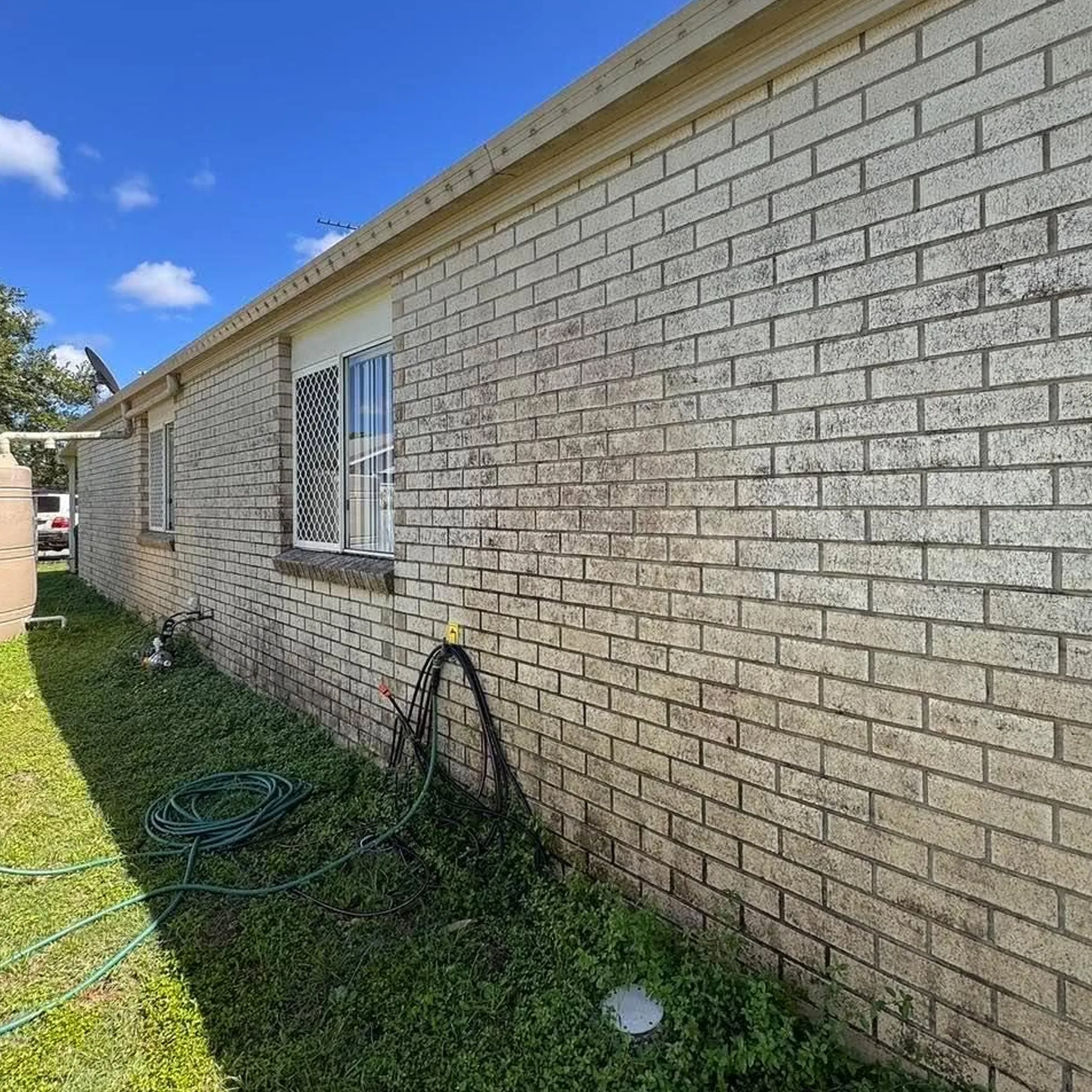 house exterior with dirt buildup